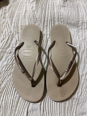 Havaianas Slim Flip Flops in Beige with Metallic Bronze Straps